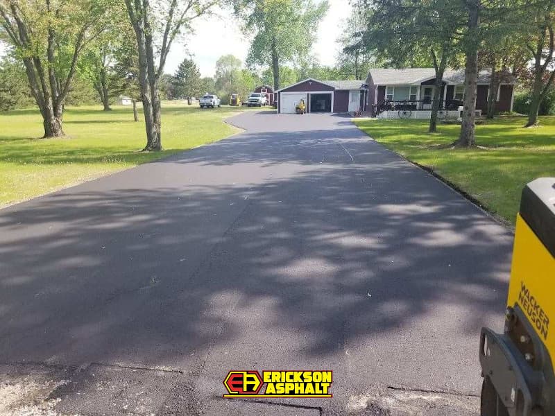 driveway with new asphalt paving