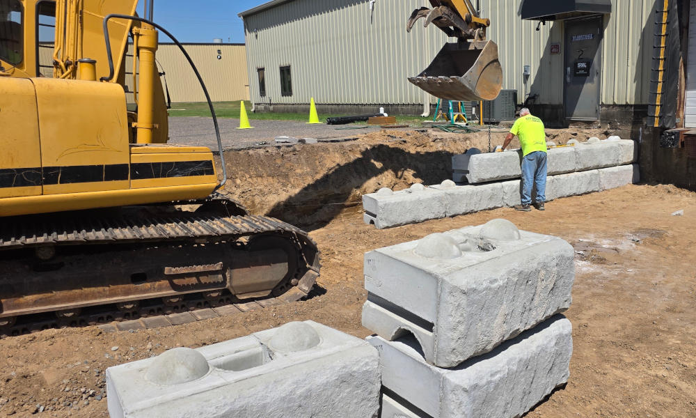 retaining wall being installed