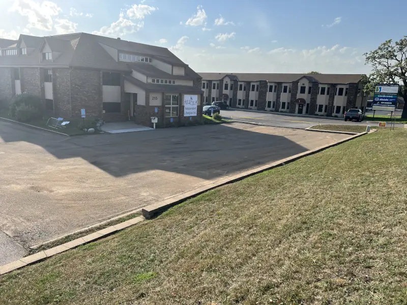 Asphalt has been removed and base has been repaired