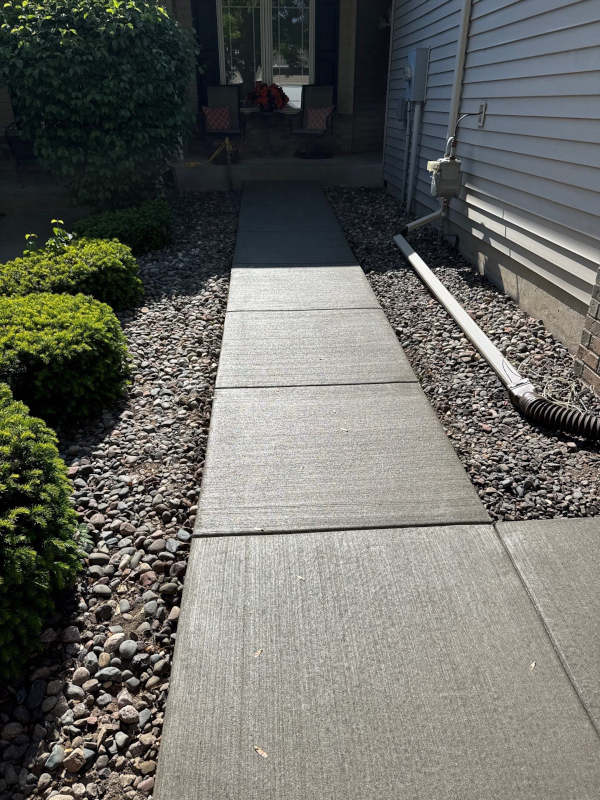 New concrete sidewalk installed