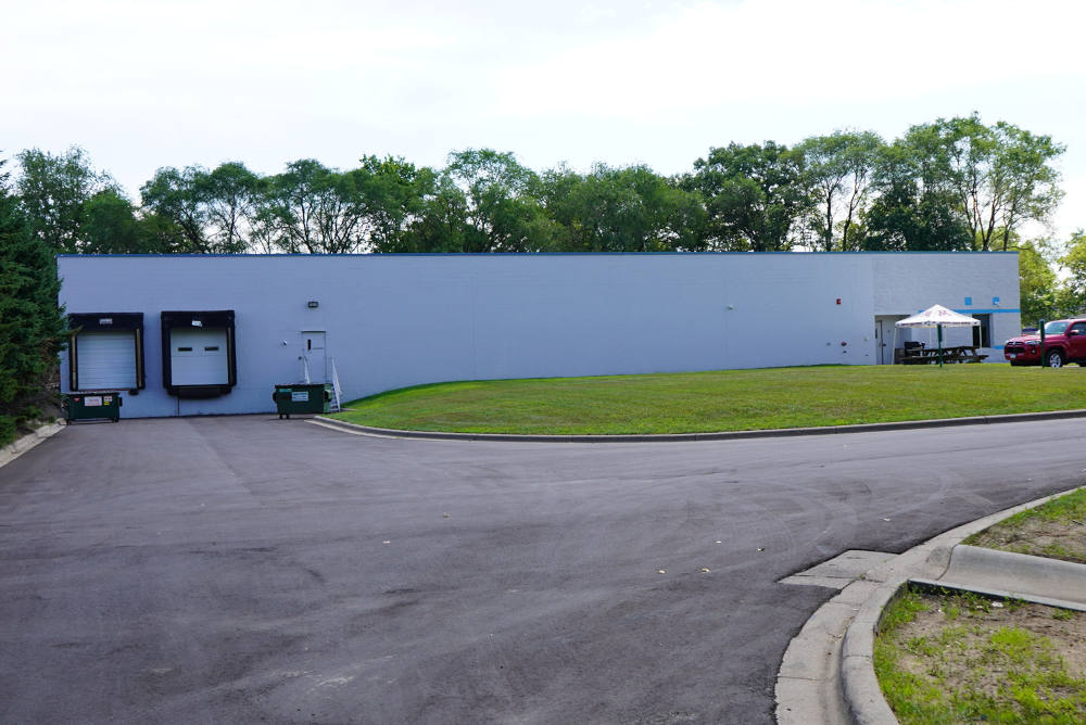 Final view of loading dock area with ne asphalt installed